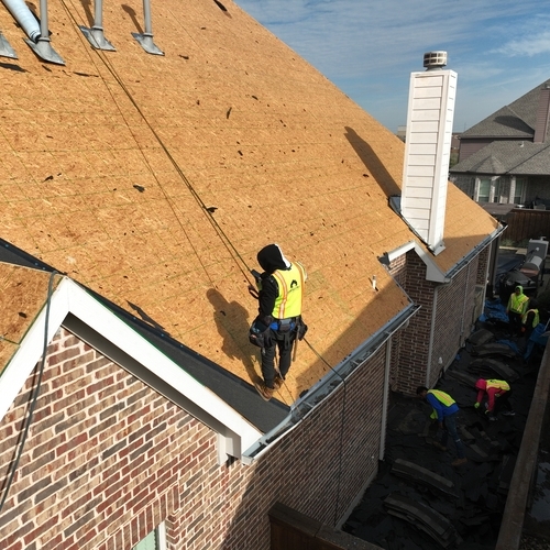 Roofers Install a New Roof.