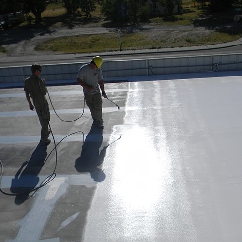 Contractors Applying Acrylic Roof Coating